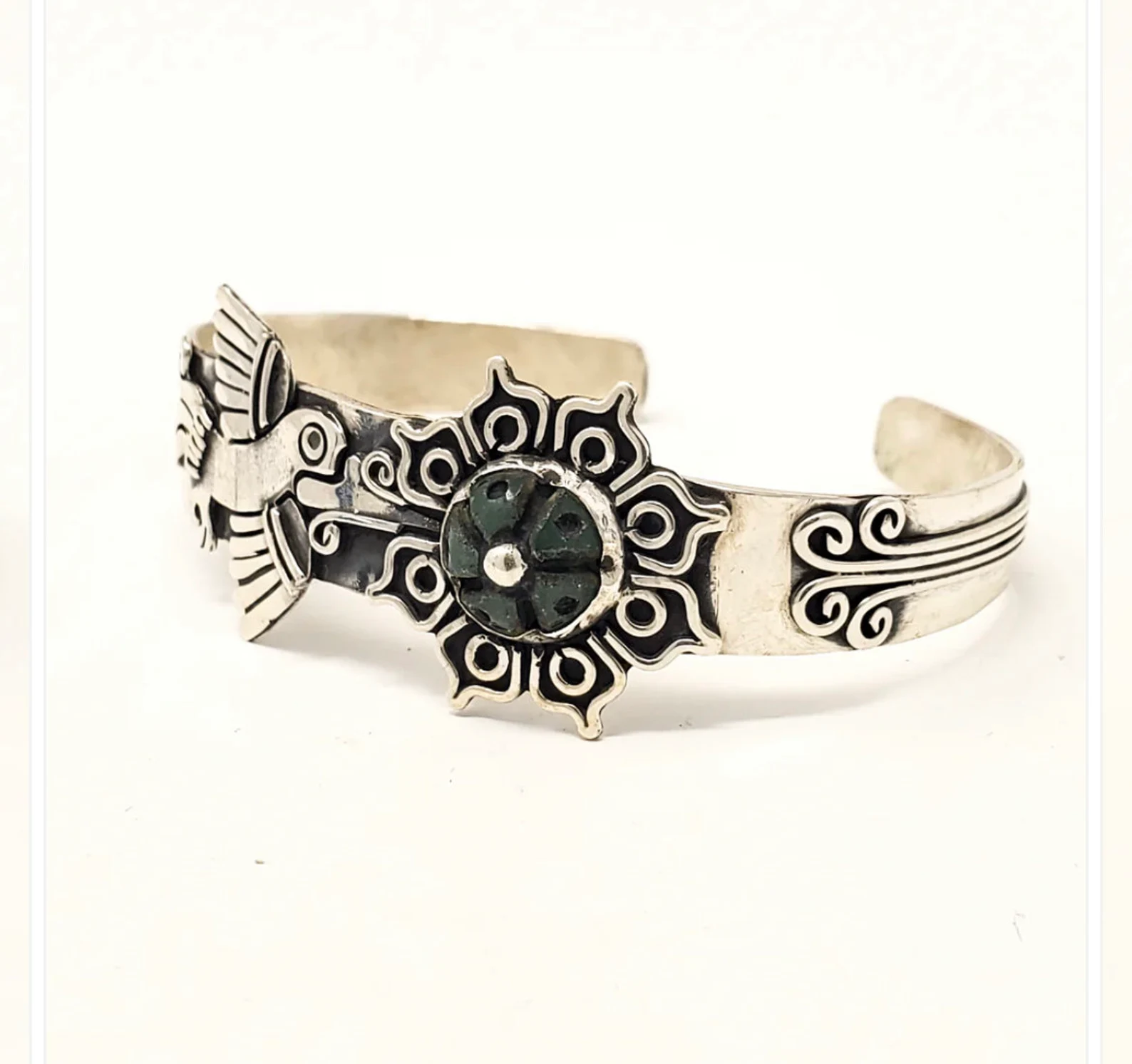 David Gutierrez - "Silver Hummingbird Cuff Bracelet with Peyote shaped Jade Cabochon Stone embedded"